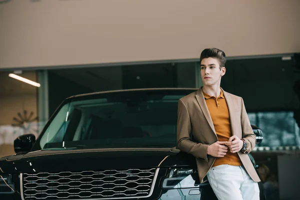 Handsome Man Standing Automobile Car Showroom — Stock Photo, Image