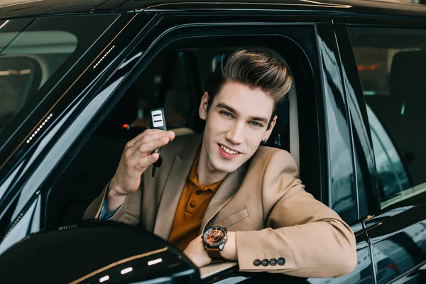 Cheerful Man Sitting Automobile Holding Car Key While Looking Camera — Stock Photo, Image