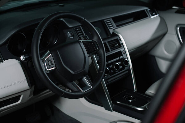 black steering wheel with buttons in automobile 