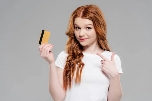 Beautiful Redhead Girl Looking Camera Pointing Finger Credit Card Isolated — Stock Photo, Image