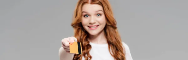 Panoramic Shot Smiling Redhead Girl Looking Camera Holding Credit Card — Stock Photo, Image