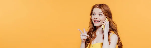 Panoramic Shot Beautiful Smiling Redhead Girl Pointing Finger While Talking — Stock Photo, Image