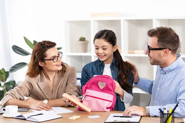 Cheerful Kid Holding Book Backpack While Standing Parents Office — Stock Photo, Image