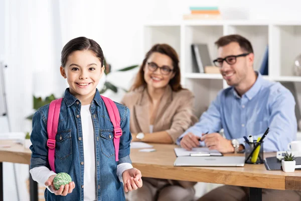 Selective Focus Cheerful Kid Backpack Holding Ball Happy Parents Office — Stock Photo, Image