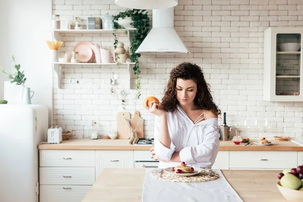 Panoramic Shot Girl Holding Orange Looking Pancakes Kitchen — Stock Photo, Image