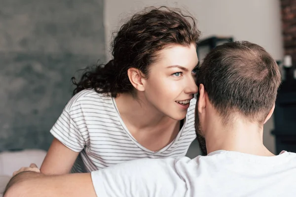 Beautiful Curly Girl Whispering Boyfriend Home — Stock Photo, Image