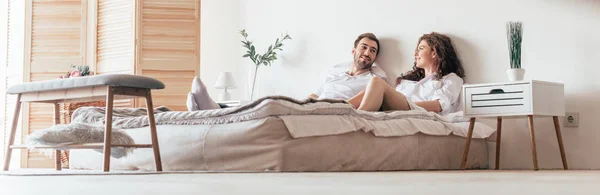 Panoramic Shot Happy Couple Lying Bed Bedroom — Stock Photo, Image