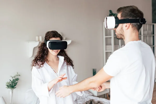 Couple Headsets Holding Hands Bedroom — Stock Photo, Image