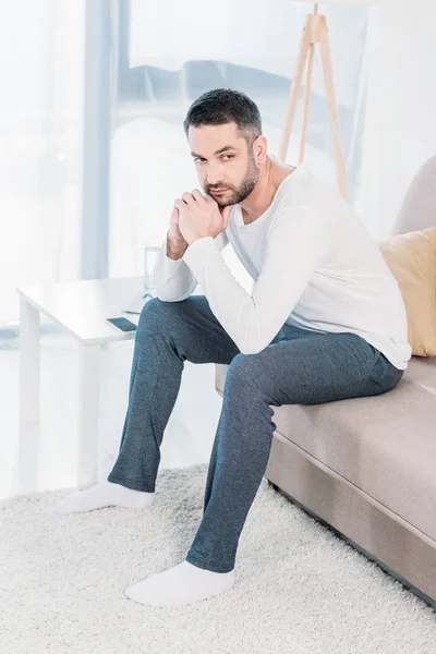 Handsome Bearded Man Sitting Couch Propping Chin Hands Home Living — Stock Photo, Image