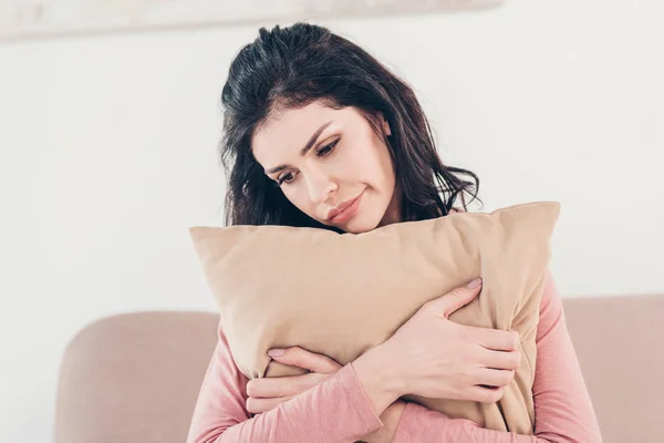 Beautiful Upset Woman Sitting Hugging Pillow Home — Stock Photo, Image