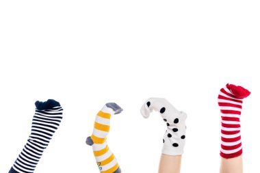 cropped view of people with colorful sock puppets on hands Isolated On White with copy space clipart