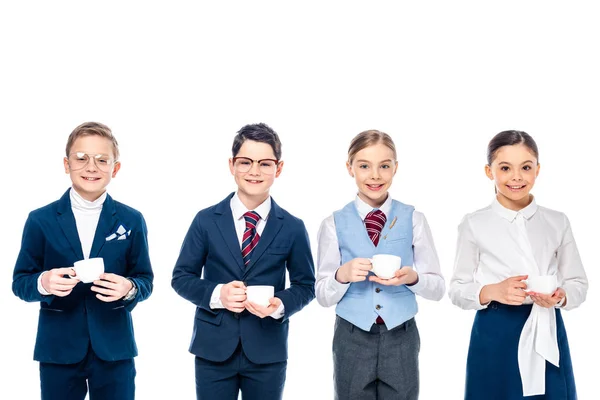 Smiling Schoolchildren Pretending Businesspeople Holding Coffee Cups Looking Camera Isolated — Stock Photo, Image