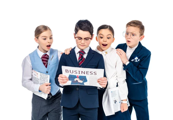 Surprised Schoolchildren Pretending Businesspeople Reading Newspaper Isolated White — Stock Photo, Image