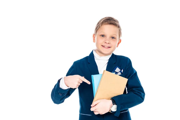 Felice Scolaro Abito Formale Che Punta Con Dito Libri Isolato — Foto Stock