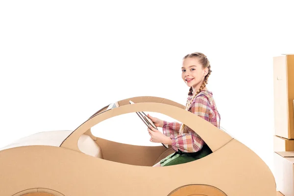 Happy Kid Looking Camera Holding Steering Wheel While Playing Cardboard — Stock Photo, Image