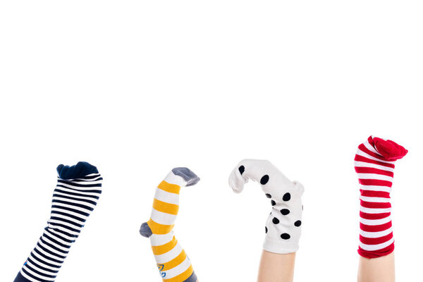 cropped view of people with colorful sock puppets on hands Isolated On White with copy space