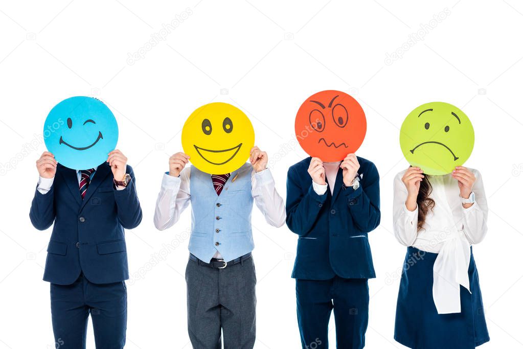 schoolchildren in formal wear covering faces with cards with various face expressions Isolated On White