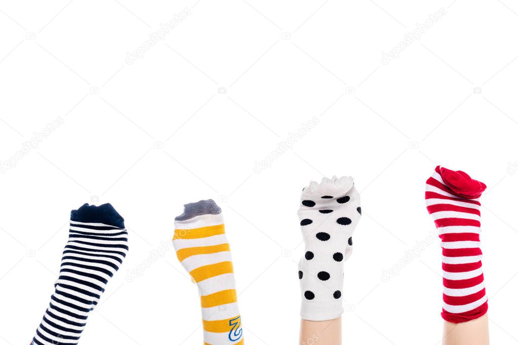 partial view of people with colorful sock puppets on hands Isolated On White with copy space