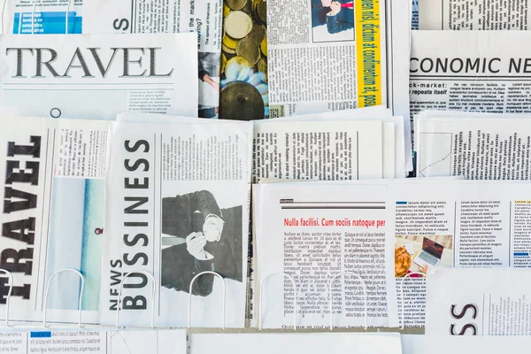 Different Print Business Travel Newspapers Stand — Stock Photo, Image