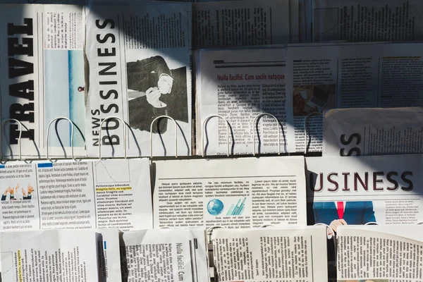 Different Print Business Travel Newspapers Stand Sunshine — Stock Photo, Image