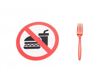 no food and drinks sign near plastic fork isolated on white clipart