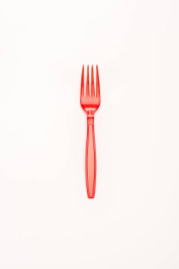 red plastic bright fork isolated on white clipart