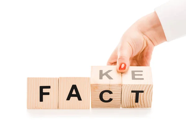 Partial View Woman Holding Wooden Blocks Fact Fake Words Isolated — Stock Photo, Image