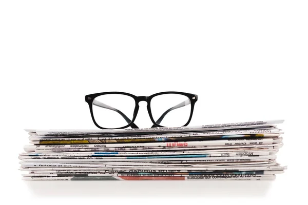 Stack Daily Newspapers Glasses Top Isolated White — Stock Photo, Image