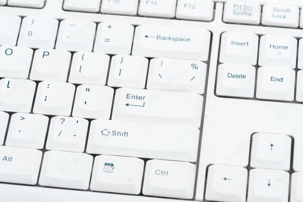 close up of buttons with symbols on white keyboard