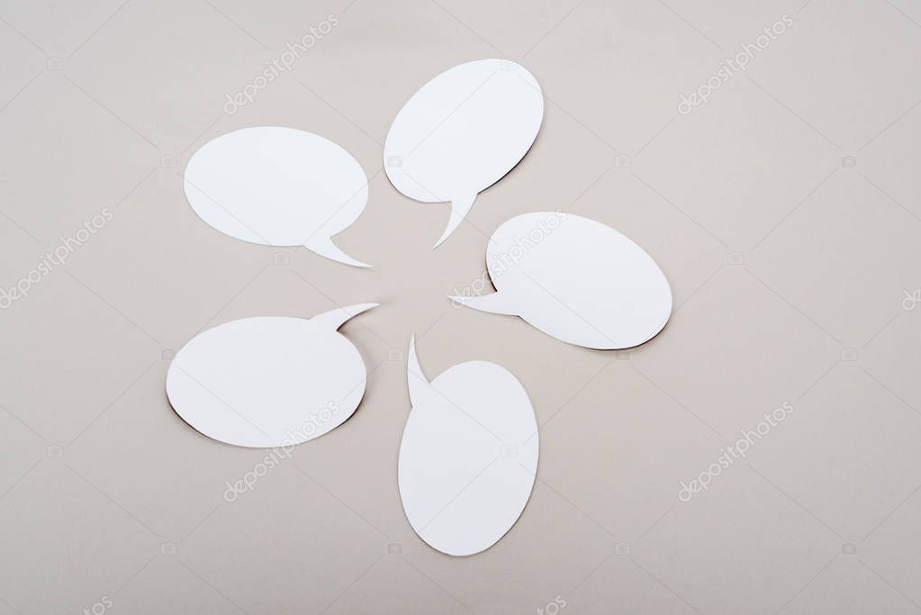 white five blank speech bubbles with copy space on grey background