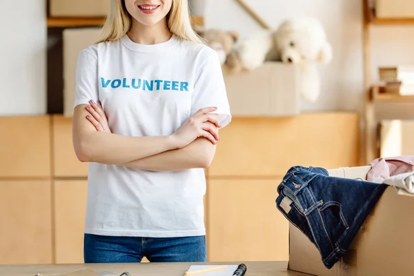 Cropped View Volunteer Standing Crossed Arms Carton Box Clothes — Stock Photo, Image