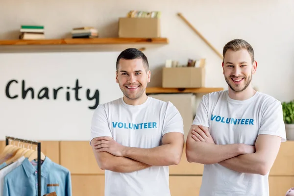 Two Handsome Volunteers Standing Crossed Arms Looking Camera — Stock Photo, Image