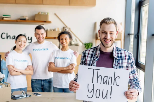 Selective Focus Handsome Man Holding Placard Thank You Text While — Stock Photo, Image