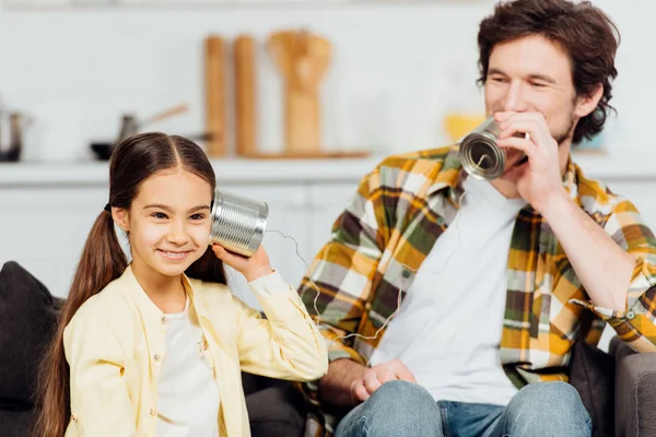 Happy Father Talking Can Phone Cheerful Daughter Listening Home — Stock Photo, Image