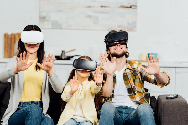Cheerful Family Gesturing While Wearing Virtual Reality Headsets Home — Stock Photo, Image
