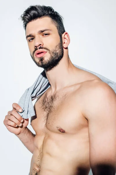 Shirtless Bearded Man Holding Shirt While Looking Camera White — Stock Photo, Image