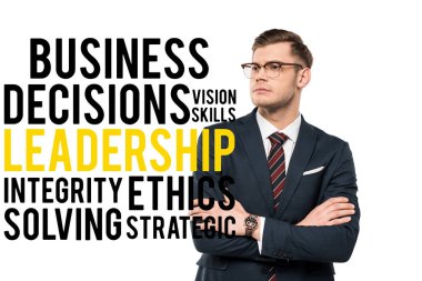 handsome businessman standing with crossed arms near business decisions vision skills leadership integrity ethics solving strategic lettering on white  clipart