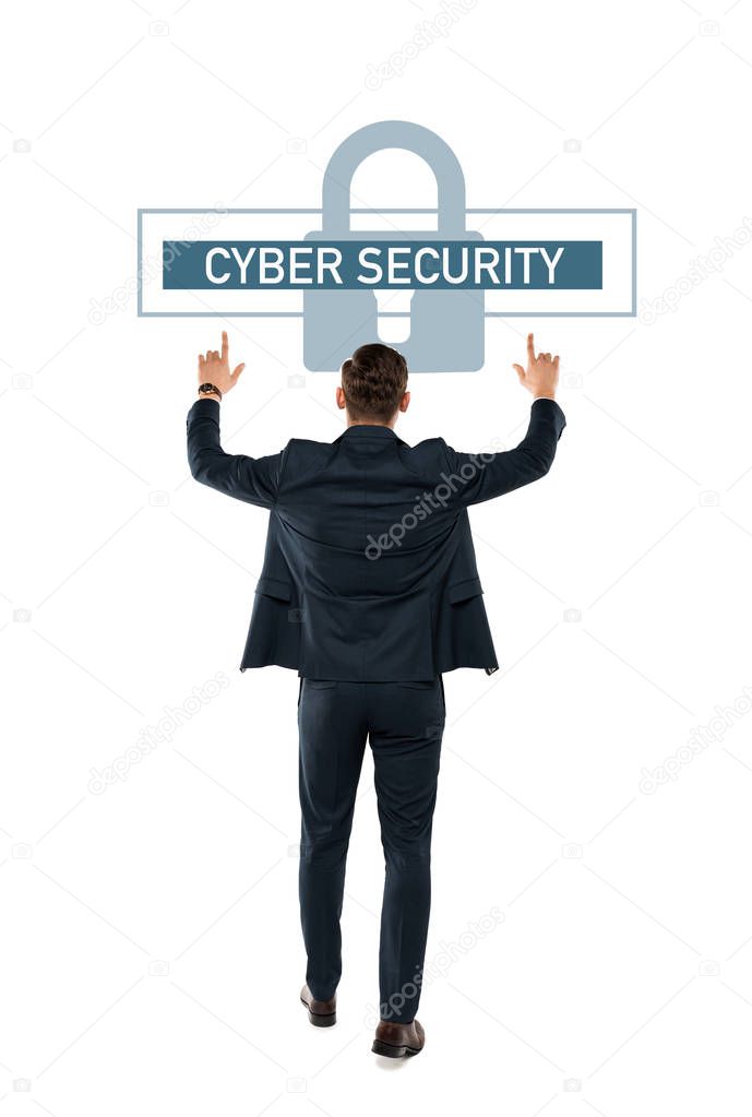 back view of businessman pointing with fingers at cyber security lettering while standing isolated on white 