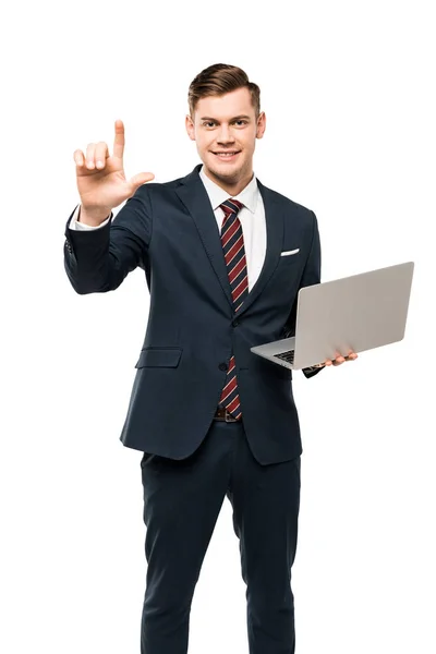 Hombre Alegre Señalando Con Dedo Mientras Sostiene Ordenador Portátil Aislado — Foto de Stock