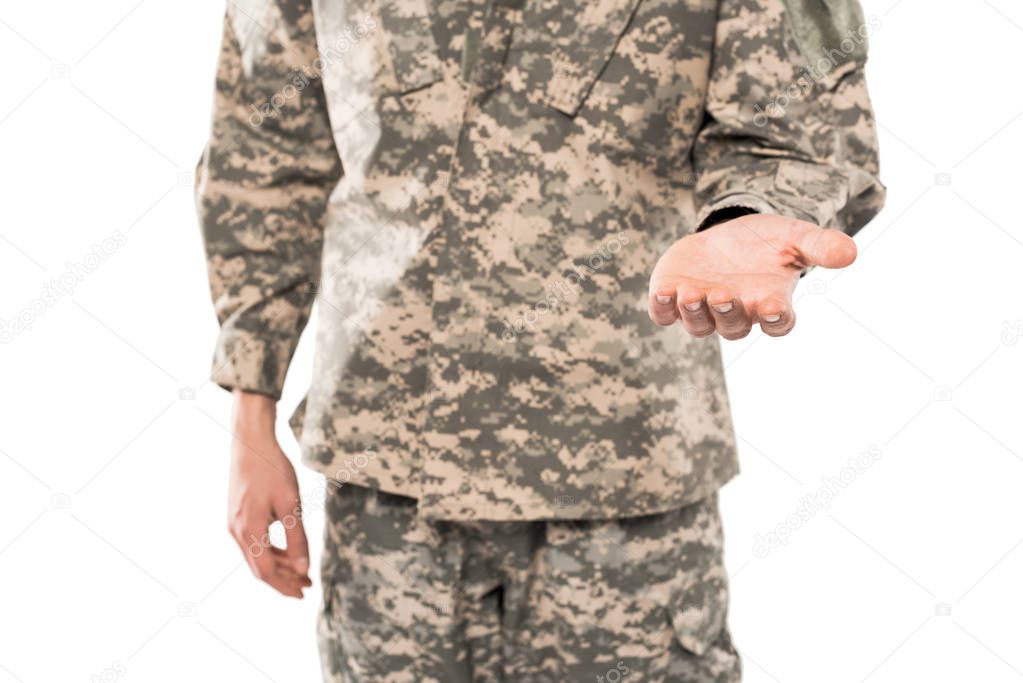 cropped view of soldier in military uniform gesturing isolated on white 