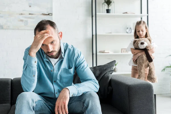 Selective Focus Upset Man Sitting Sofa Daughter Home — Stock Photo, Image