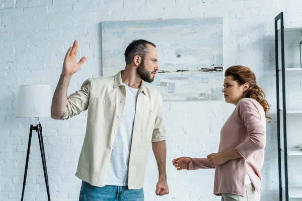 Scared Woman Looking Aggressive Husband Gesturing Home — Stock Photo, Image