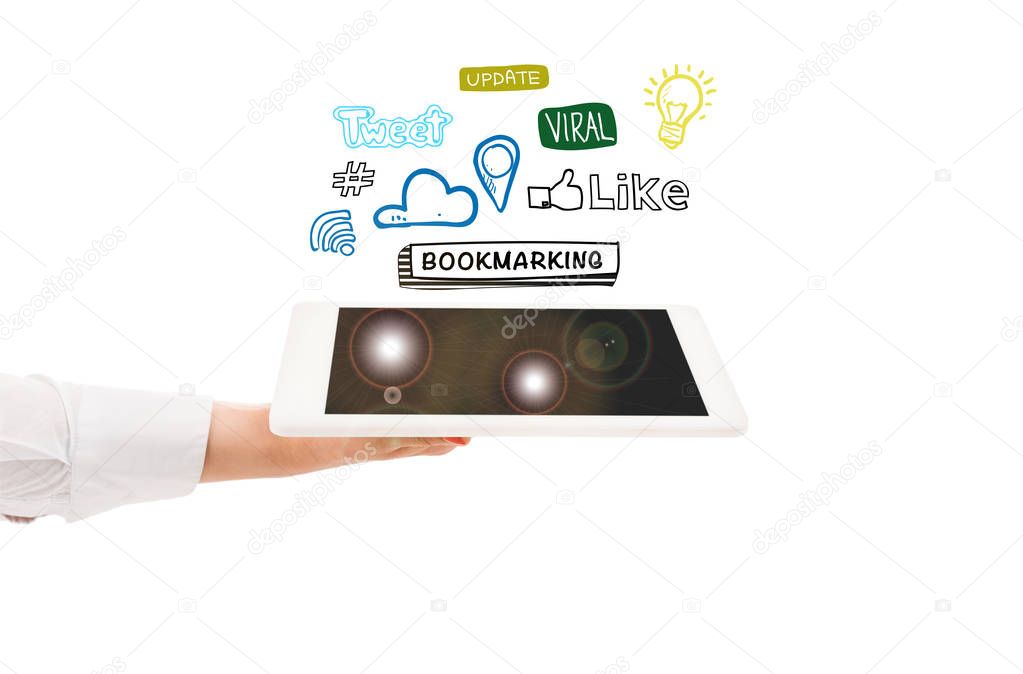 cropped view of woman holding digital tablet with social media icons above isolated on white