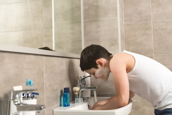 Preteen Boy Washing Face Morning Bathroom — Stock Photo, Image