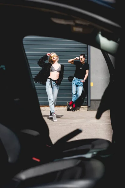 Stylish Handsome Man Beautiful Girl Posing Gesturing Garage — Stock Photo, Image