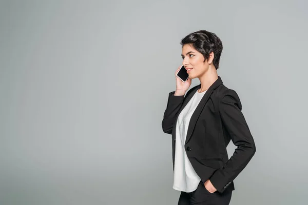 Beautiful Mixed Race Businesswoman Talking Smartphone While Holding Hand Pocket — Stock Photo, Image