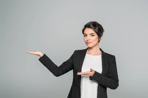 Beautiful Mixed Race Businesswoman Pointing Hands Looking Camera Isolated Grey — Stock Photo, Image