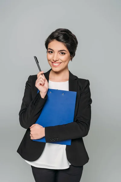 Cheerful Mixed Race Businesswoman Smiling Camera While Holding Clipboard Pen — Stock Photo, Image