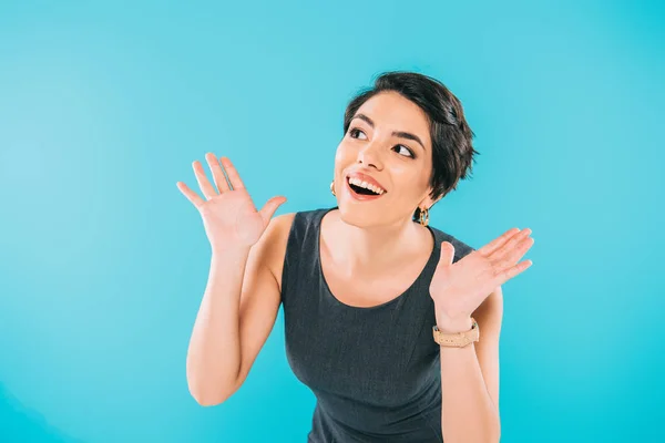 Excited Mixed Race Woman Gesturing While Looking Away Isolated Blue — Stock Photo, Image