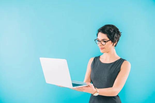 Beautiful Mixed Race Businesswoman Glasses Using Laptop Isolated Blue — Stock Photo, Image